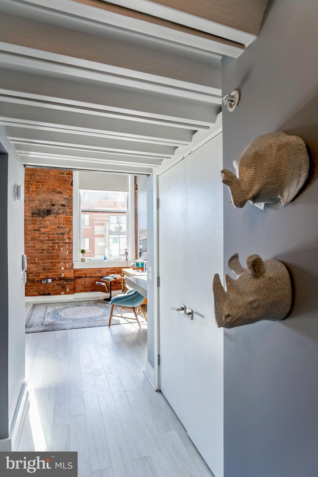 1401 R Street Northwest, Unit 303 Washington, DC 20009 - Photo 10 of 28 Looking down the hallway into the living room