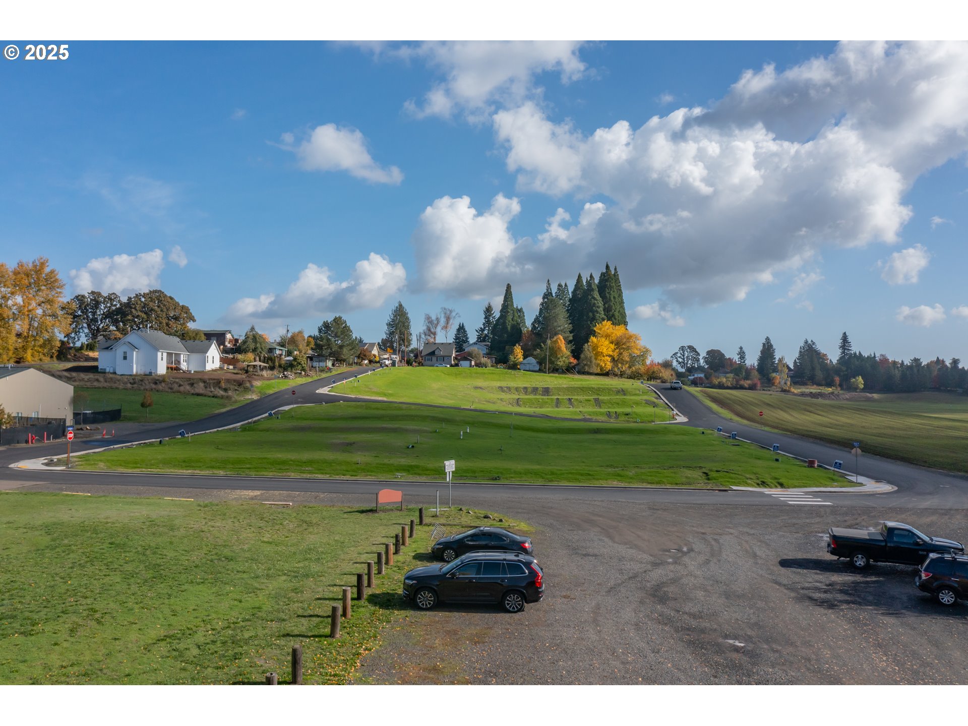 4 Block 6 Carlton, OR 97111 - Photo 28 of 43 a childrens park with lots of green space houses and trees in the background