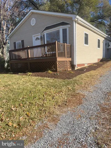a view of a house with a fence