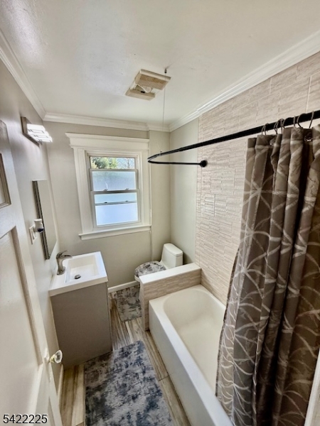 33 Ella Street Bloomfield, NJ 07003 - Photo 15 of 19 a bathroom with a sink toilet and shower