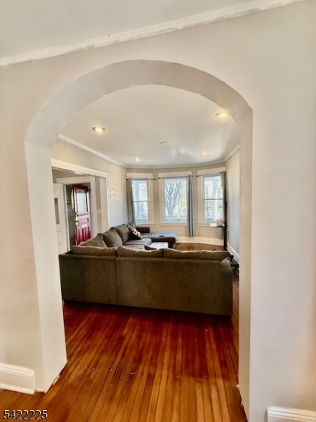33 Ella Street Bloomfield, NJ 07003 - Photo 6 of 19 a living room with furniture and wooden floor