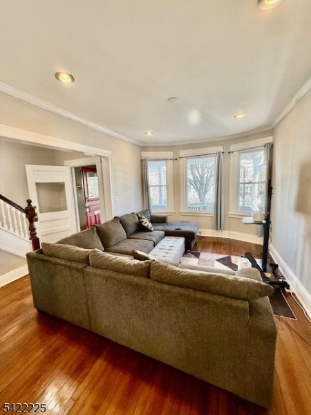 33 Ella Street Bloomfield, NJ 07003 - Photo 7 of 19 a living room with furniture and a large window