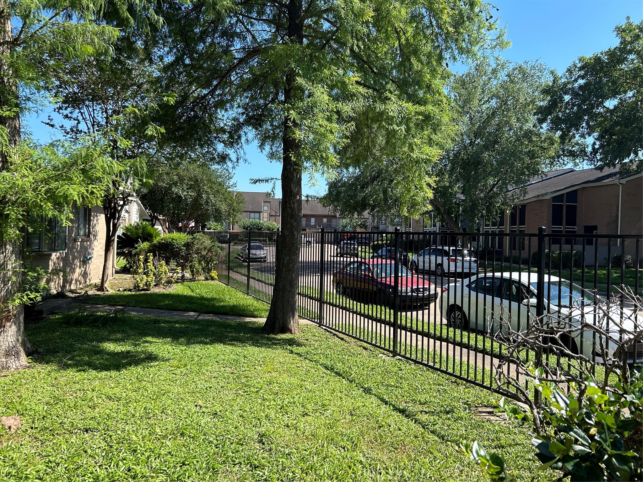 8030 Sands Point Drive, Unit D Houston, TX 77036 - Photo 14 of 14 a view of a backyard
