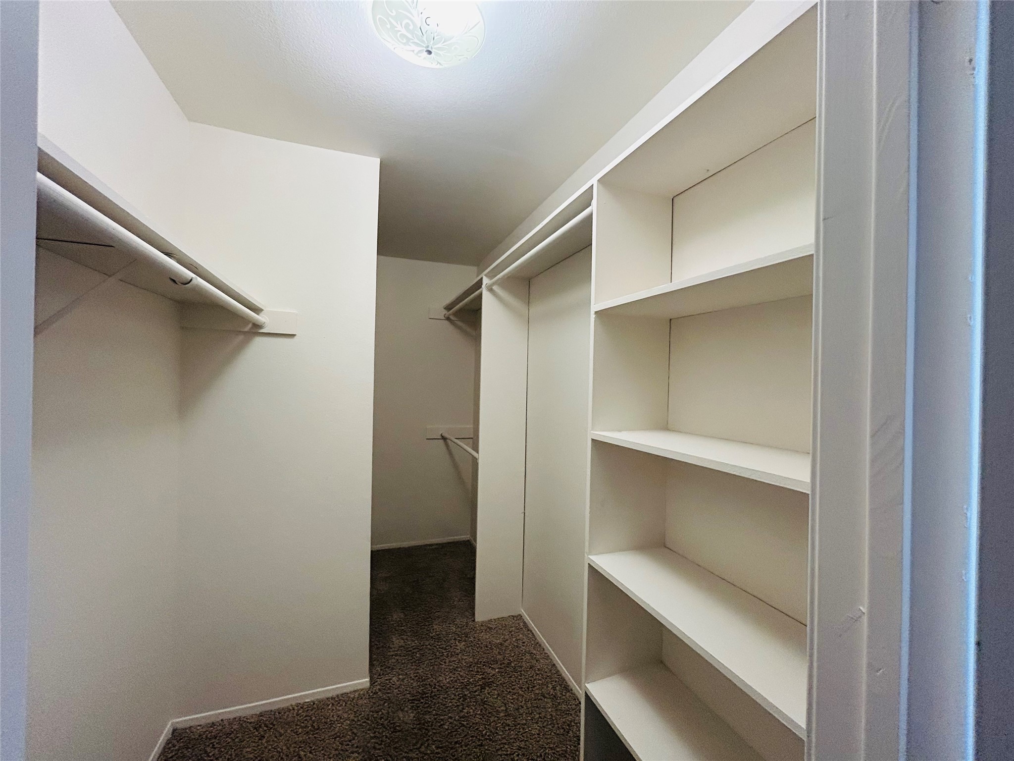 8030 Sands Point Drive, Unit D Houston, TX 77036 - Photo 8 of 24 a view of an empty walk in closet