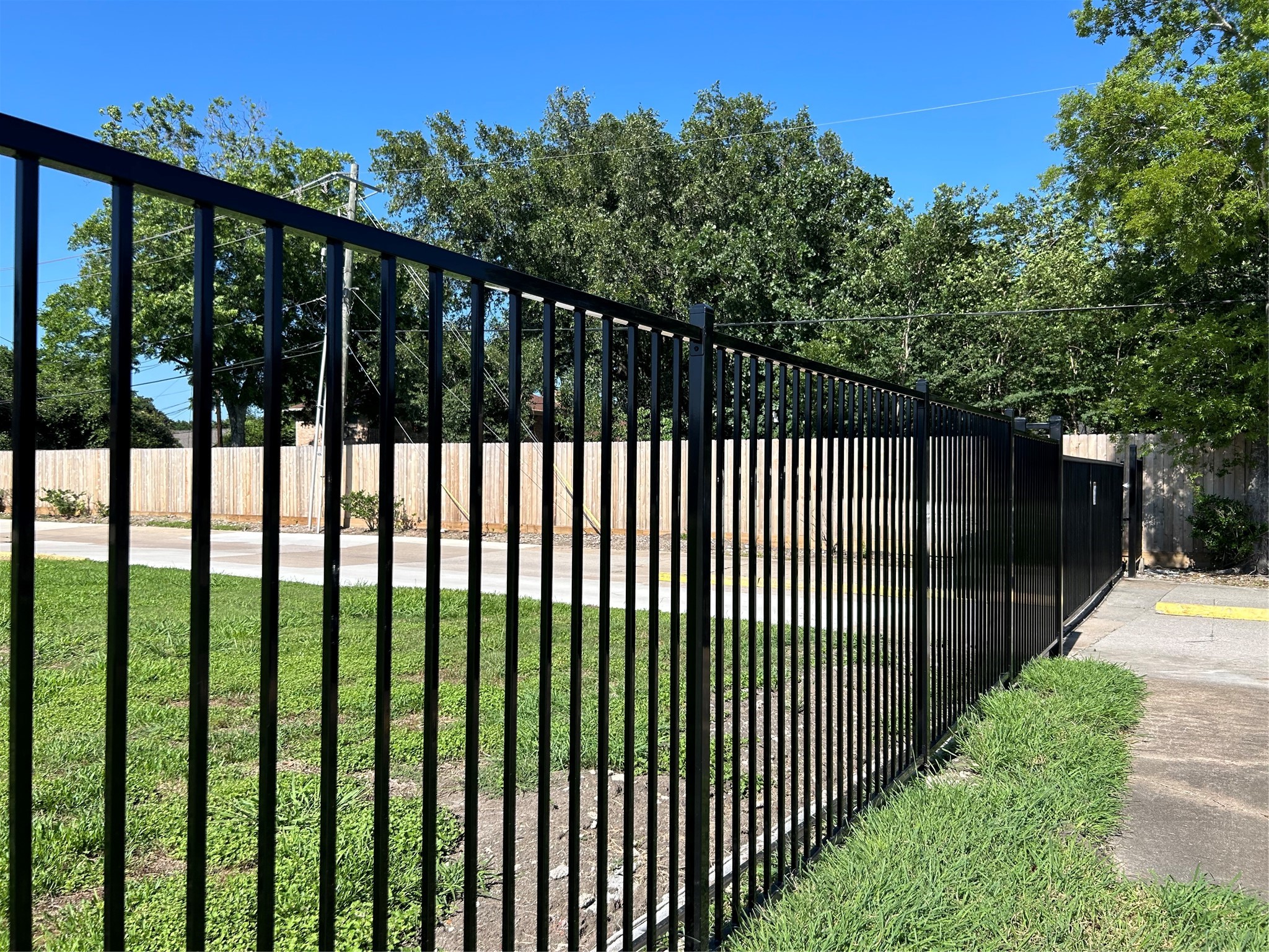 8030 Sands Point Drive, Unit D Houston, TX 77036 - Photo 9 of 14 a view of a black gate