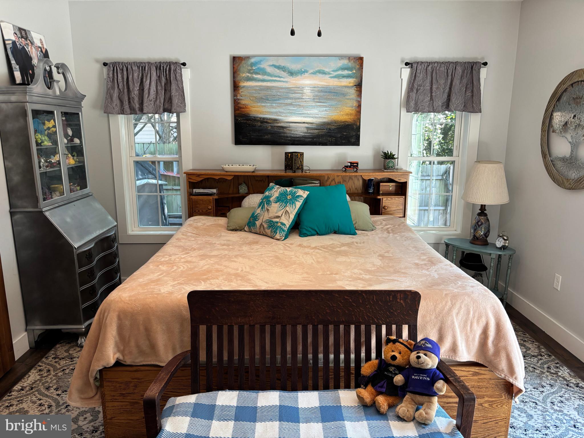 5549 Bonnie Brook Road Cambridge, MD 21613 - Photo 22 of 28 a bedroom with a bed and flat screen tv