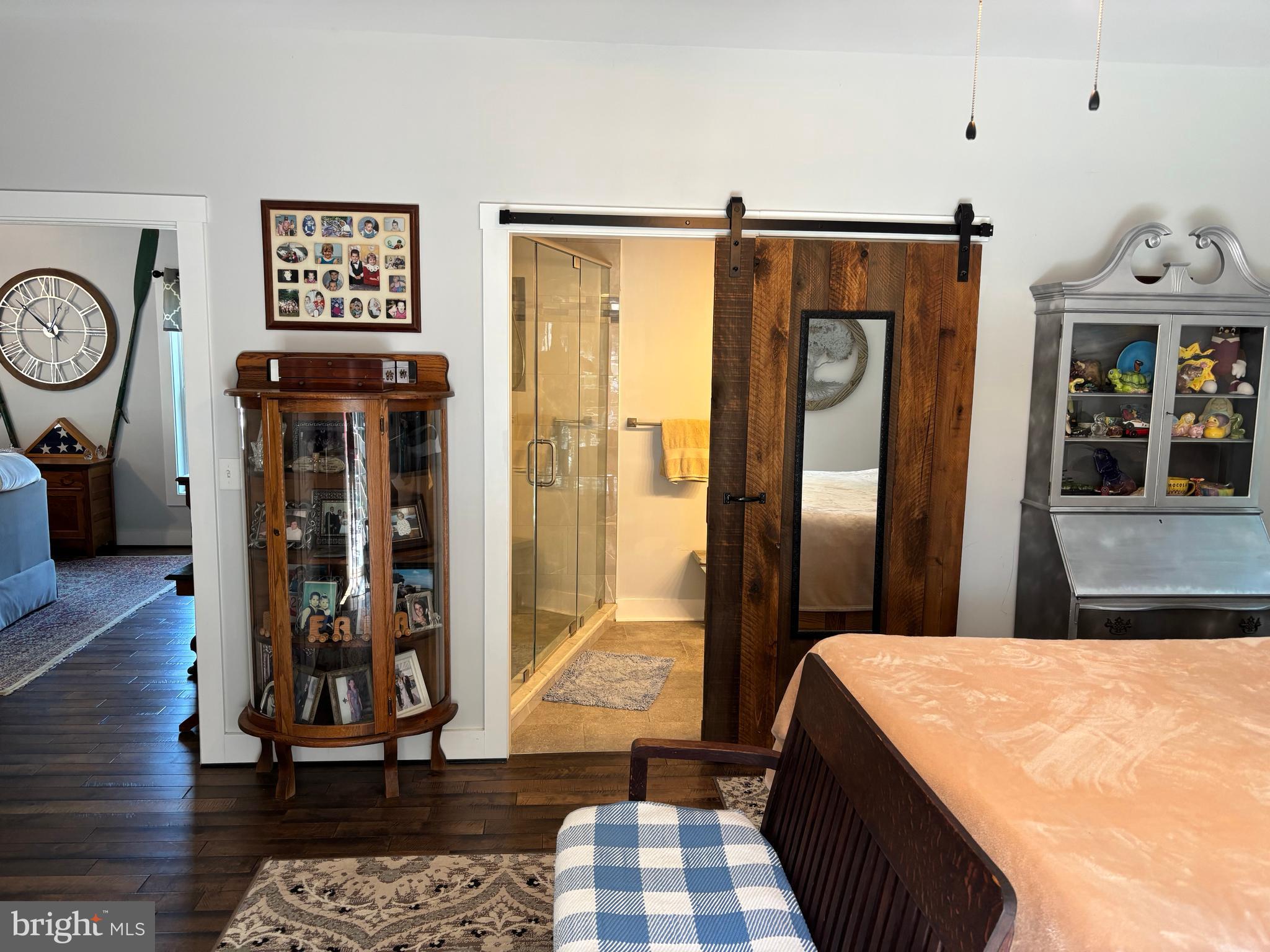 5549 Bonnie Brook Road Cambridge, MD 21613 - Photo 24 of 28 a view of a hallway with wooden floor and windows