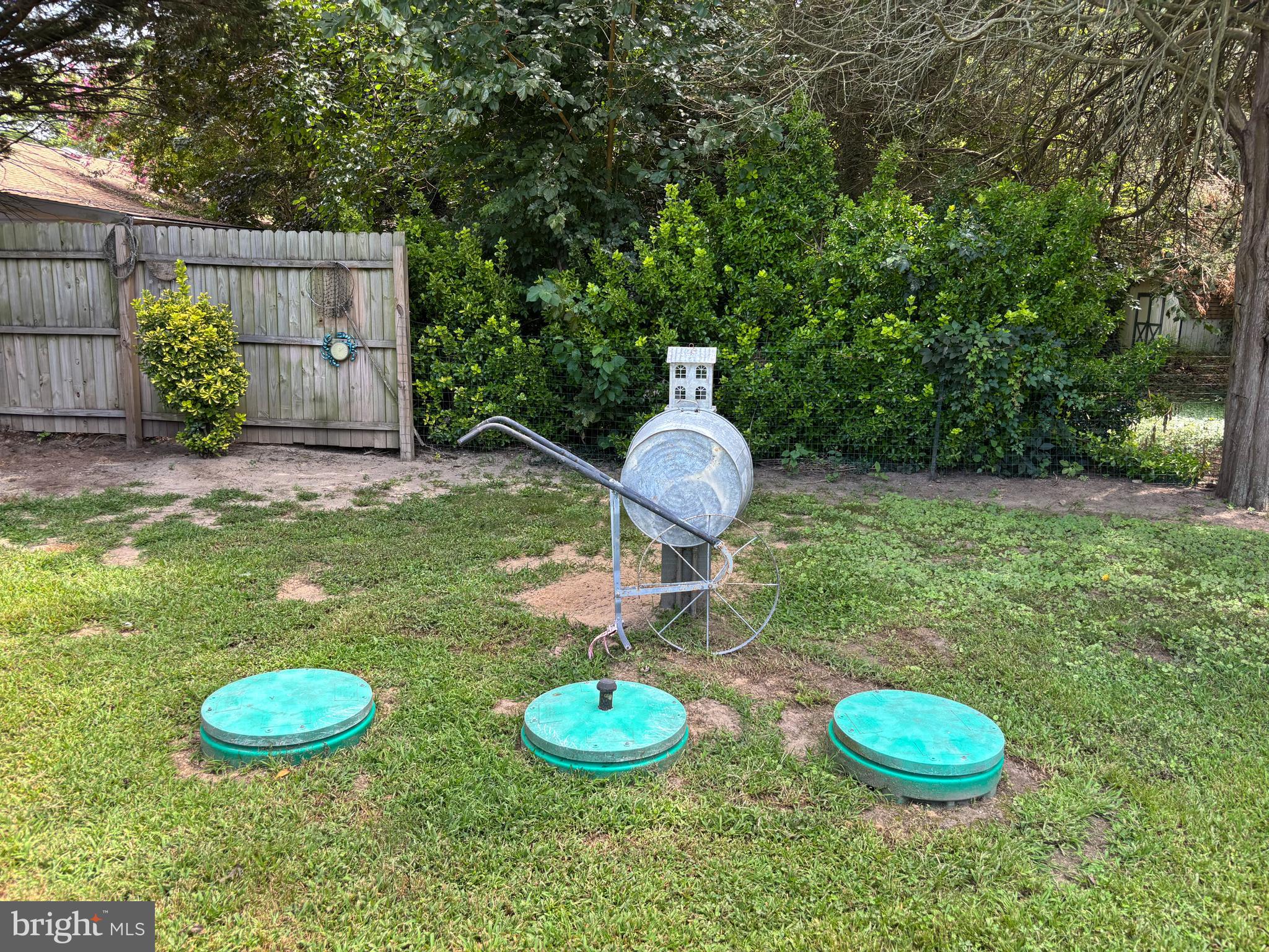 5549 Bonnie Brook Road Cambridge, MD 21613 - Photo 4 of 28 a backyard of a house with table and chairs