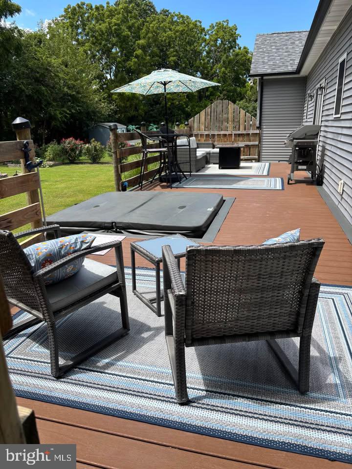 5549 Bonnie Brook Road Cambridge, MD 21613 - Photo 5 of 28 a view of outdoor kitchen with seating space