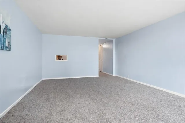 a view of a kitchen with furniture and window