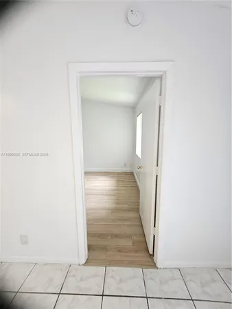 a view of a livingroom with wooden floor