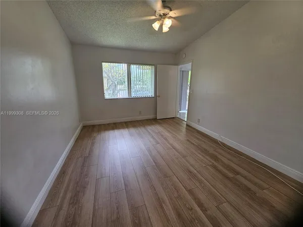 a bathroom with a toilet a sink and a bathtub