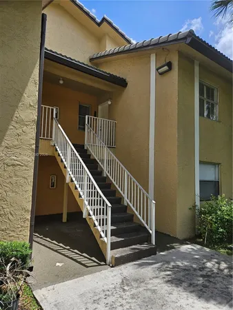 a view of balcony with small garden
