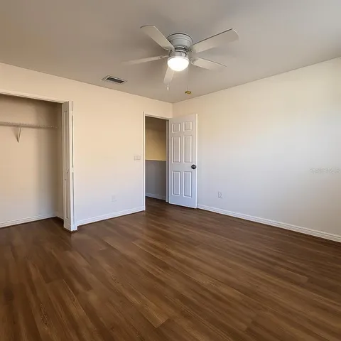 a living room with a couch and a fireplace