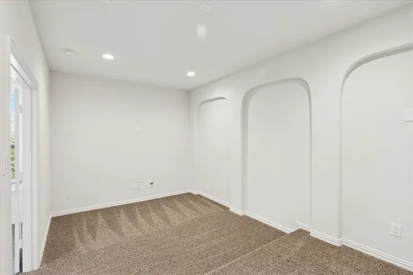 an empty room with a natural light