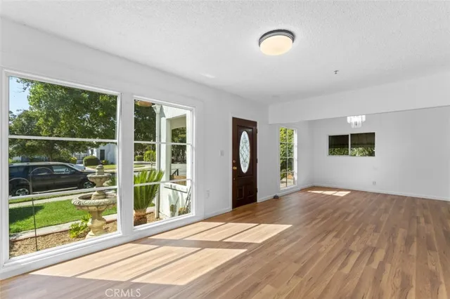 a view of a living room and front door