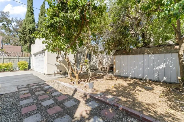 a backyard of a house with lots of green space