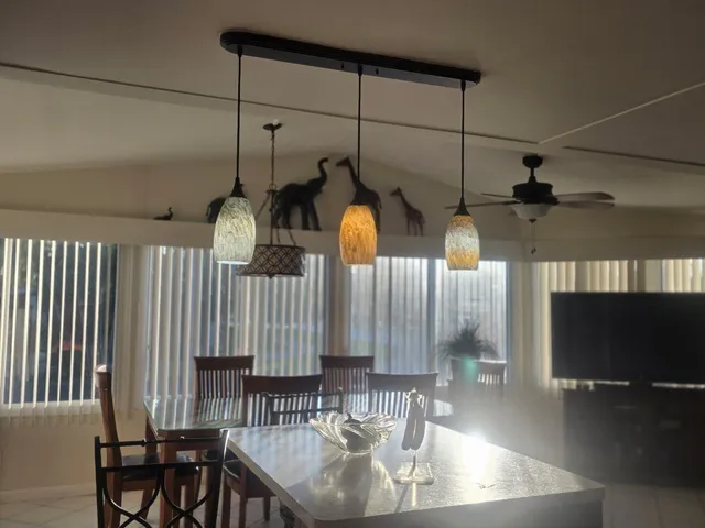 a bedroom with a bed and chair