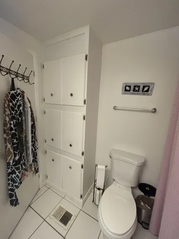 a bedroom with a bed and furniture