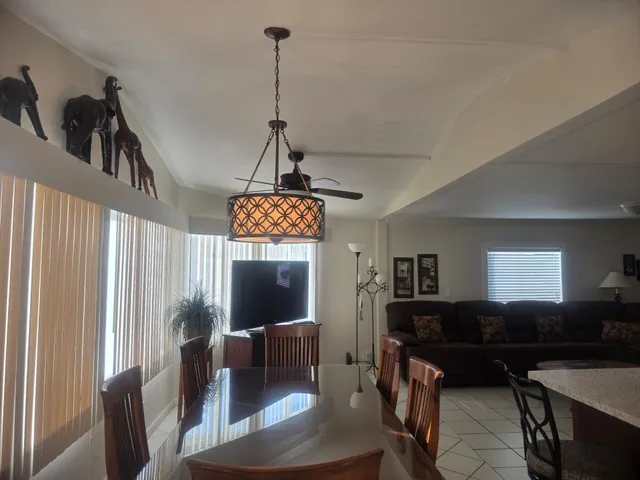 a kitchen with a sink a stove and cabinets