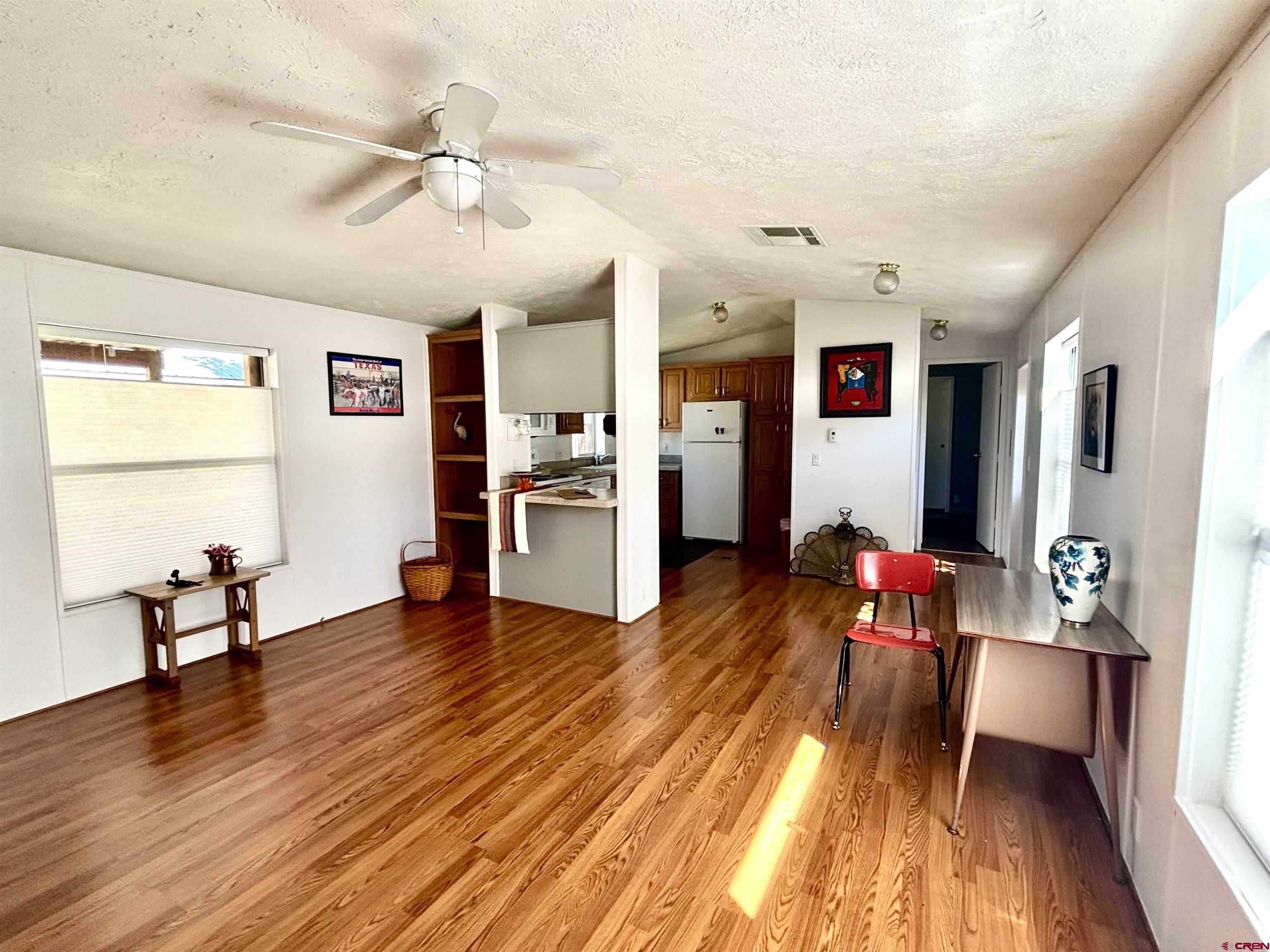288 Animas View Drive, Unit 9 Durango, CO 81301 - Photo 9 of 16 a living room with furniture and a wooden floor