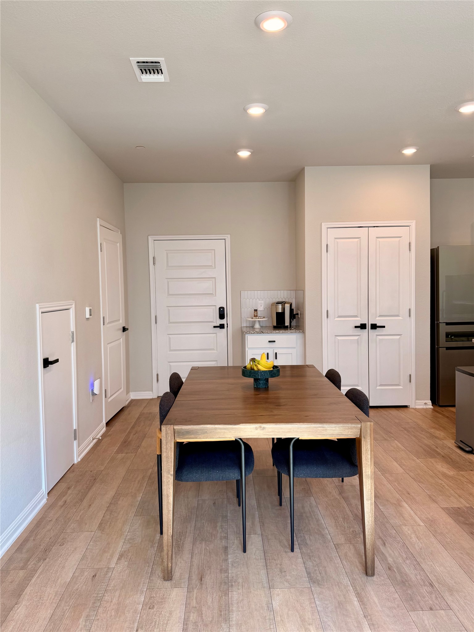 9015 Cattle Baron Path, Unit 1803 Austin, TX 78747 - Photo 6 of 23 Dining room with light wood-type flooring and recessed lighting