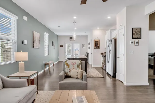 a living room with furniture and a table