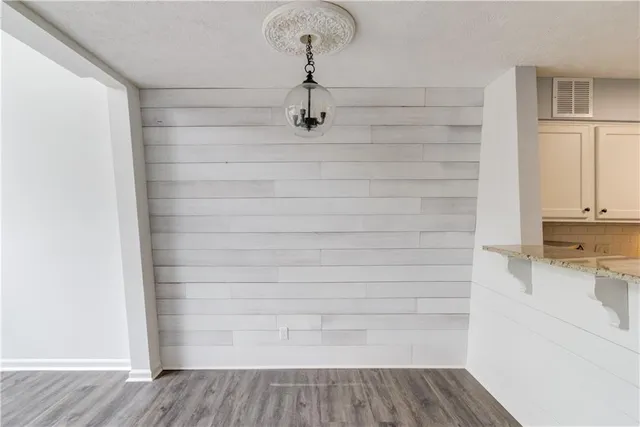 a living room with a furniture and a window