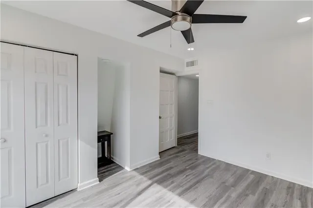 a aerial view of a house with a backyard