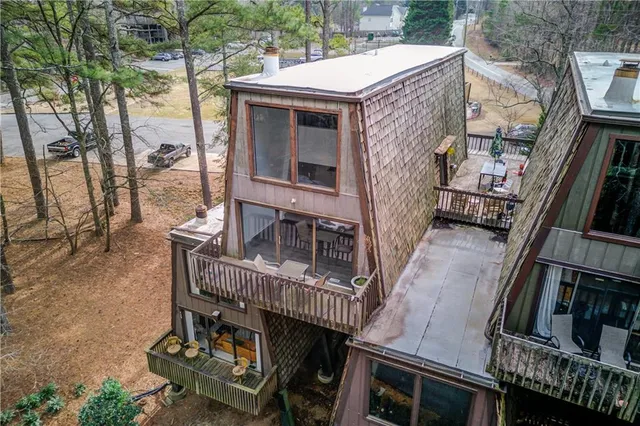 a view of a swimming pool with a yard