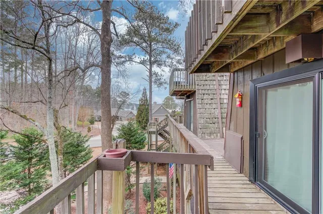 a view of balcony with furniture