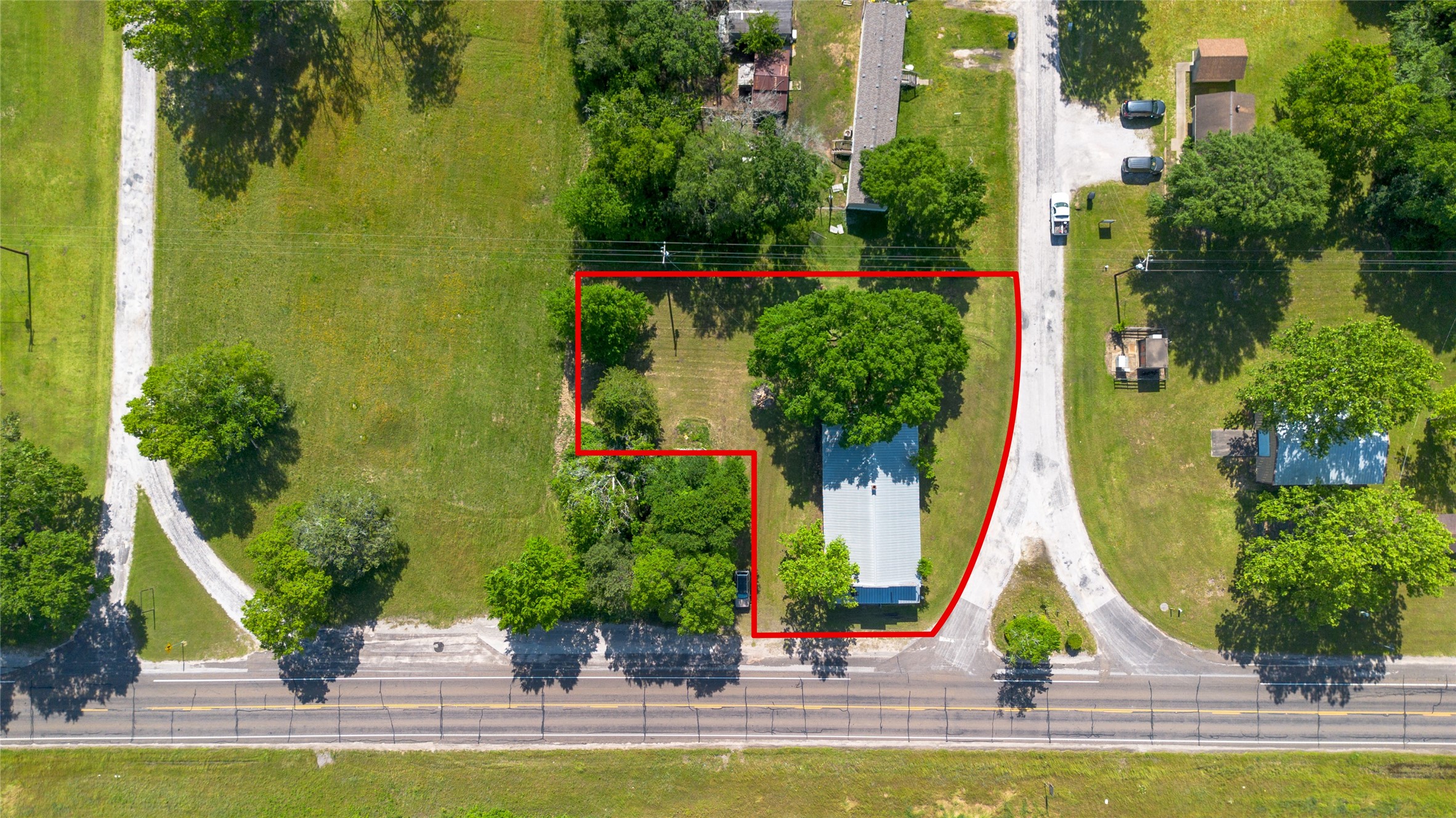 a view of house with swimming pool and porch