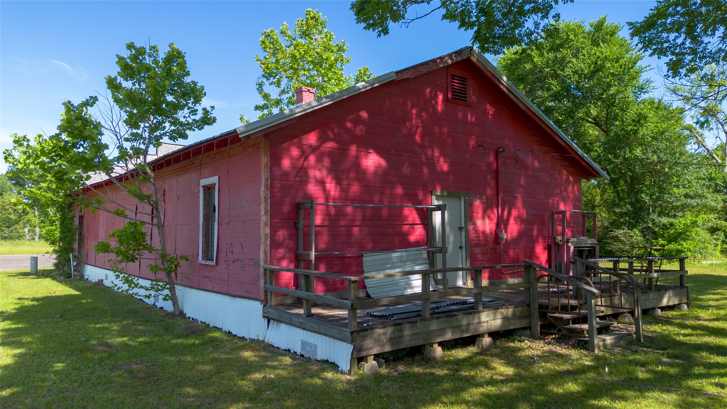 190 Fm 405 Street Huntsville, TX 77320 - Photo 14 of 15 a view of a house with backyard