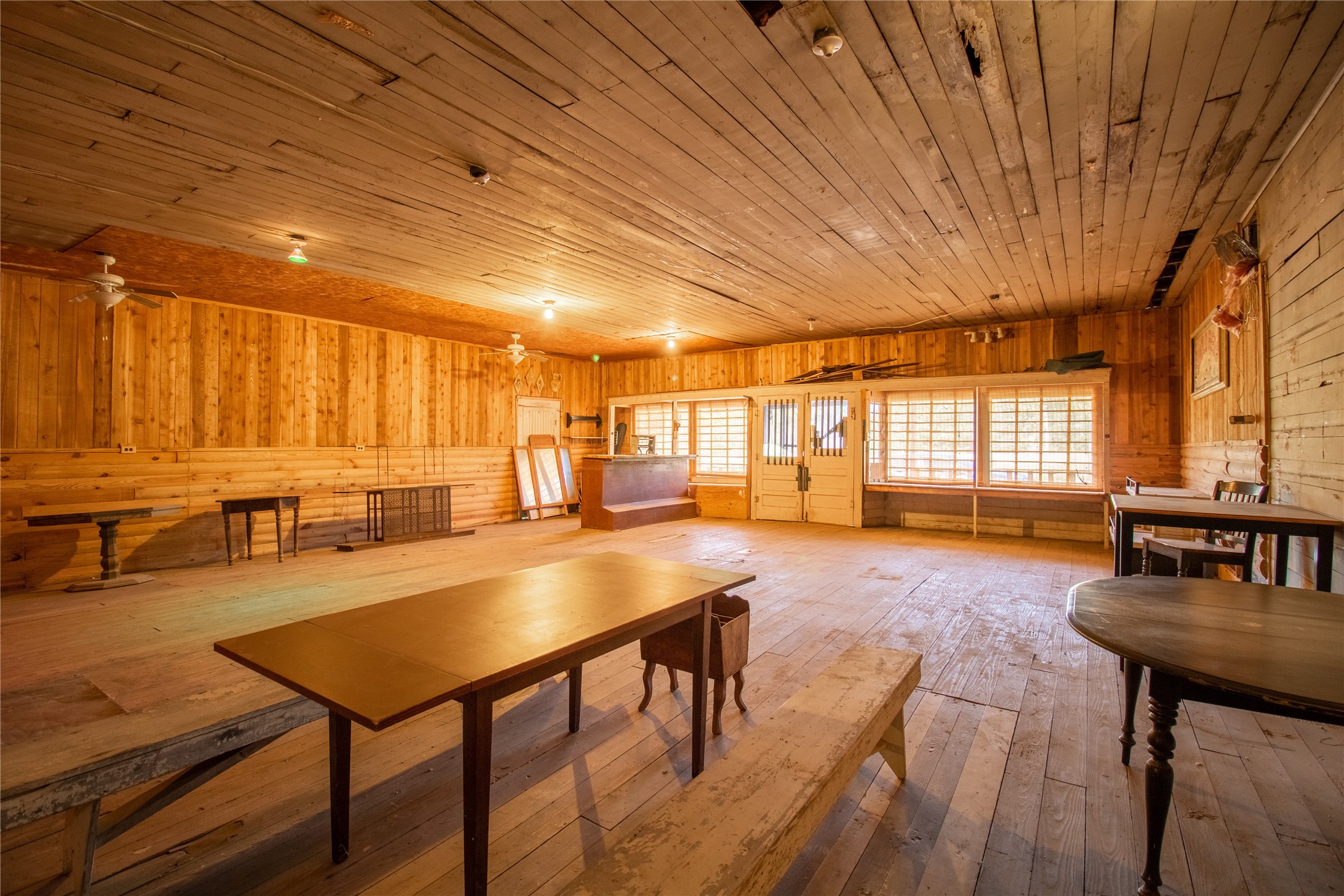 190 Fm 405 Street Huntsville, TX 77320 - Photo 8 of 15 a living room with stainless steel appliances dining table furniture and a large window