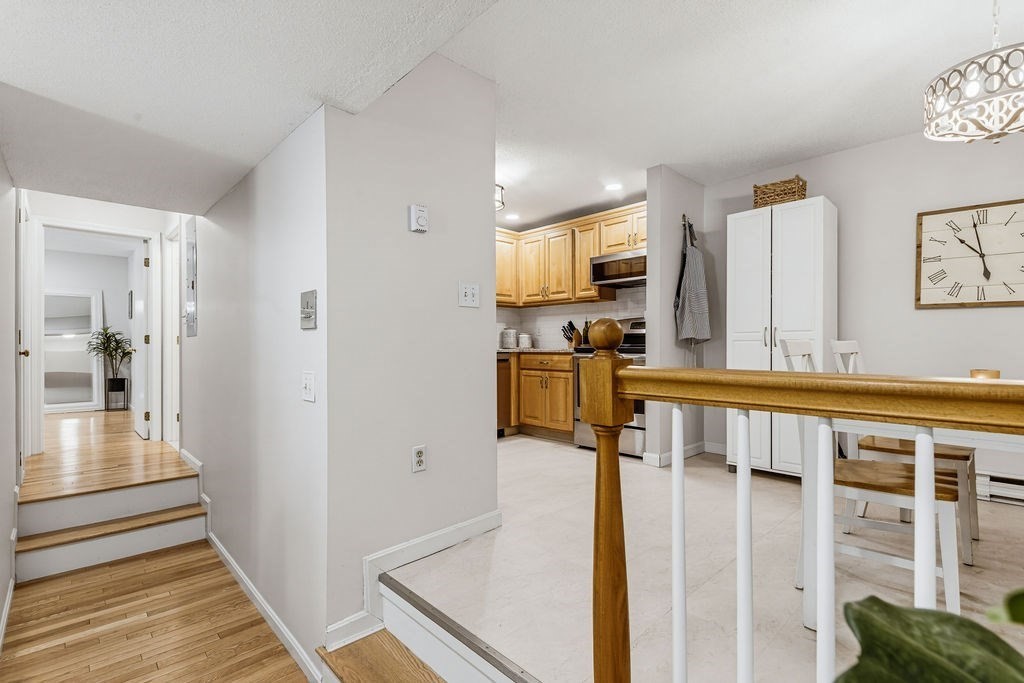 10 Erick Road, Unit 42 Mansfield, MA 02048 - Photo 17 of 33 a view of a kitchen from the hallway