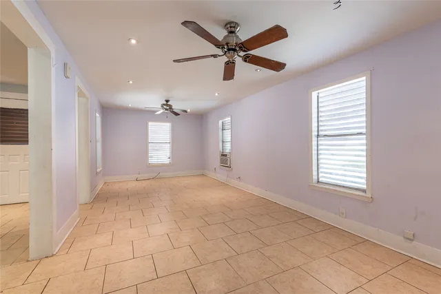 a kitchen with stainless steel appliances granite countertop a sink a stove and cabinets