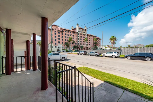 a view of a house with large windows