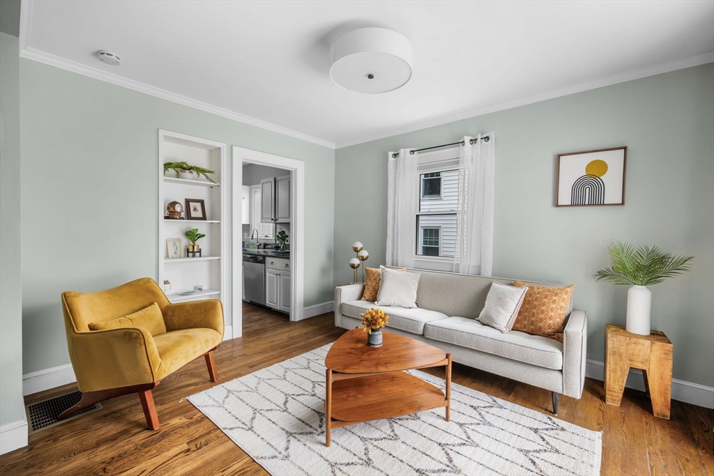 8 Baker Avenue Beverly, MA 01915 - Photo 12 of 40 a living room with furniture and wooden floor
