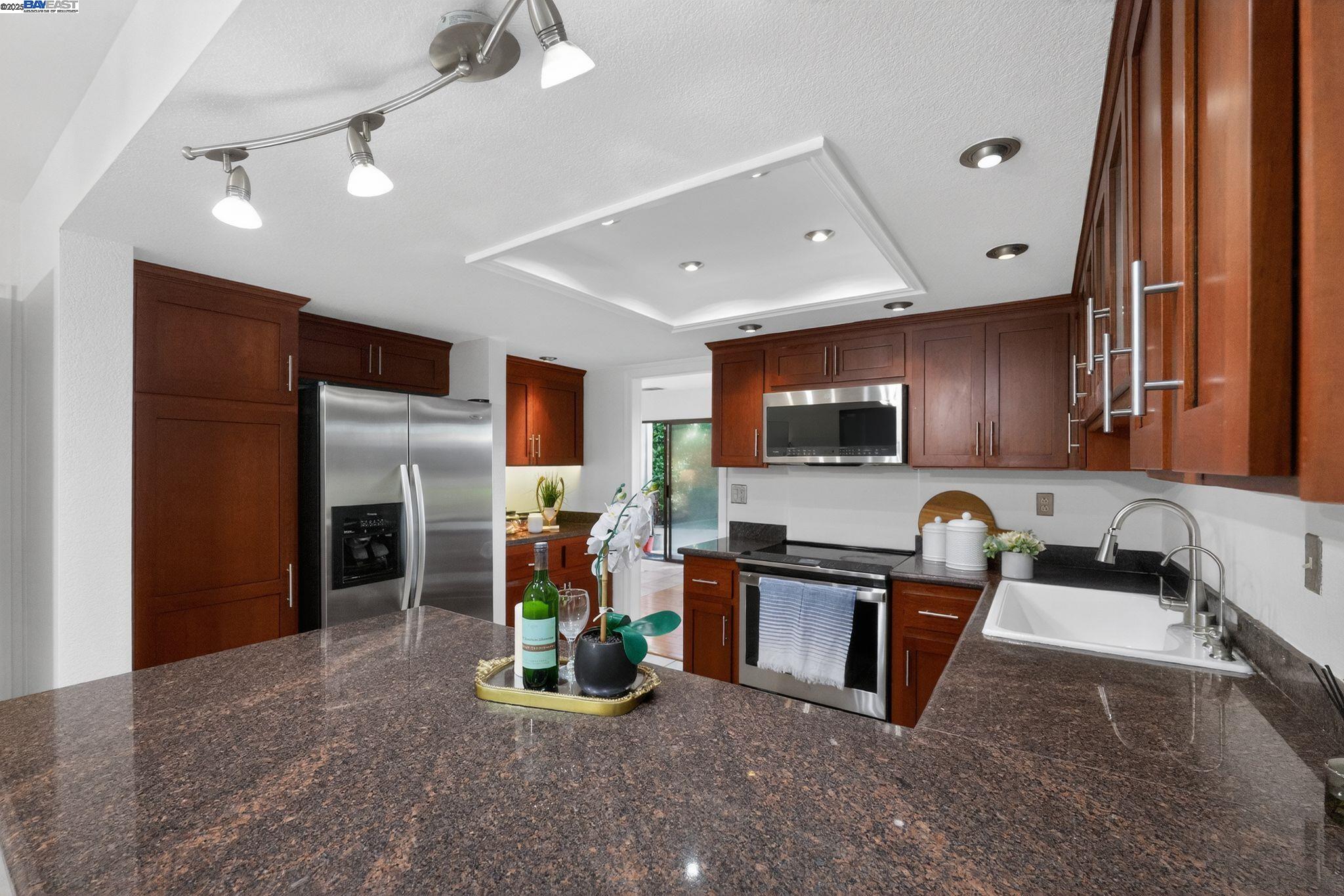 7210 Valley View Court Pleasanton, CA 94588 - Photo 12 of 44 a kitchen with lots of counter top space