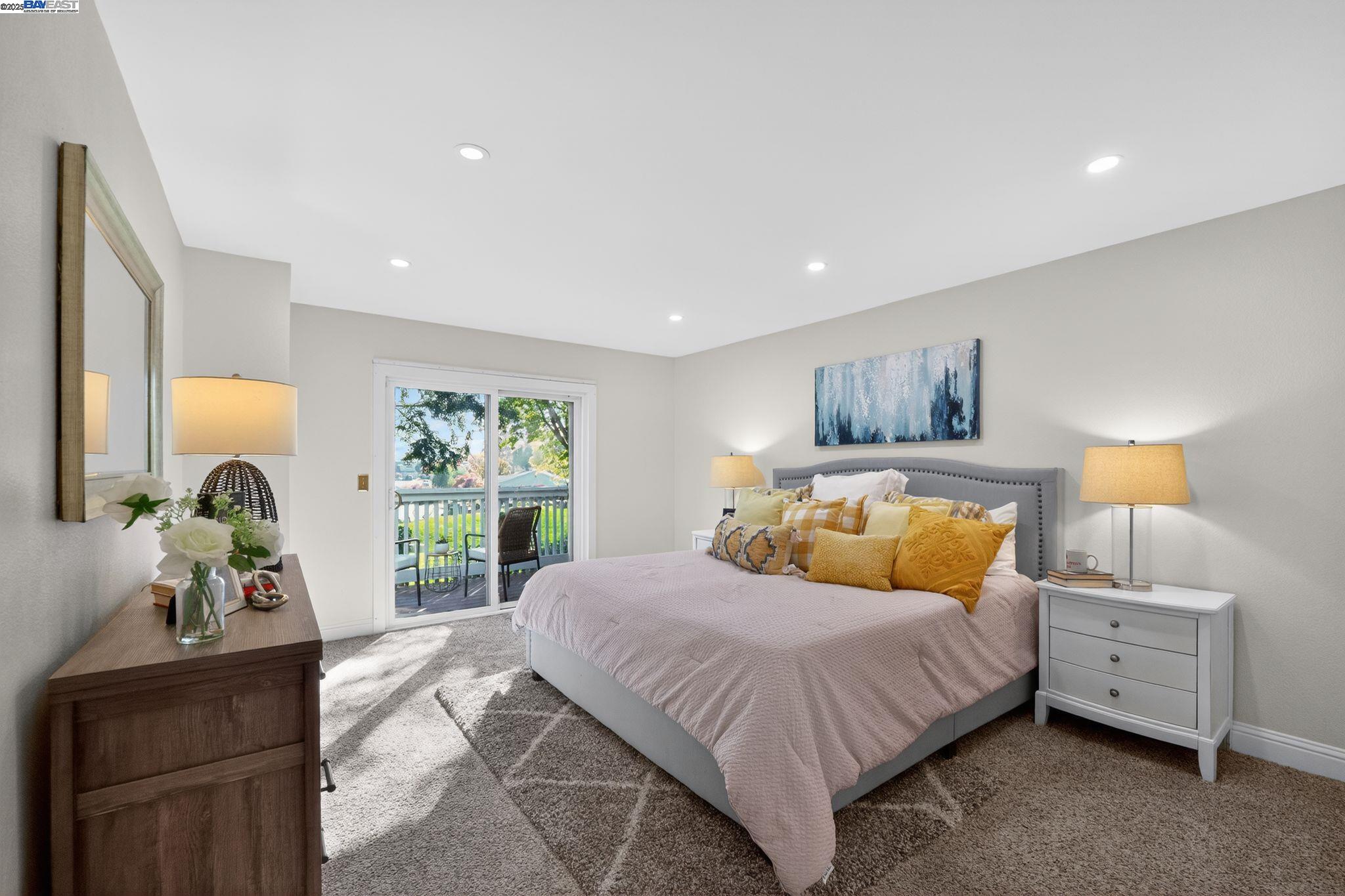 7210 Valley View Court Pleasanton, CA 94588 - Photo 20 of 44 a bedroom with a large bed and a window