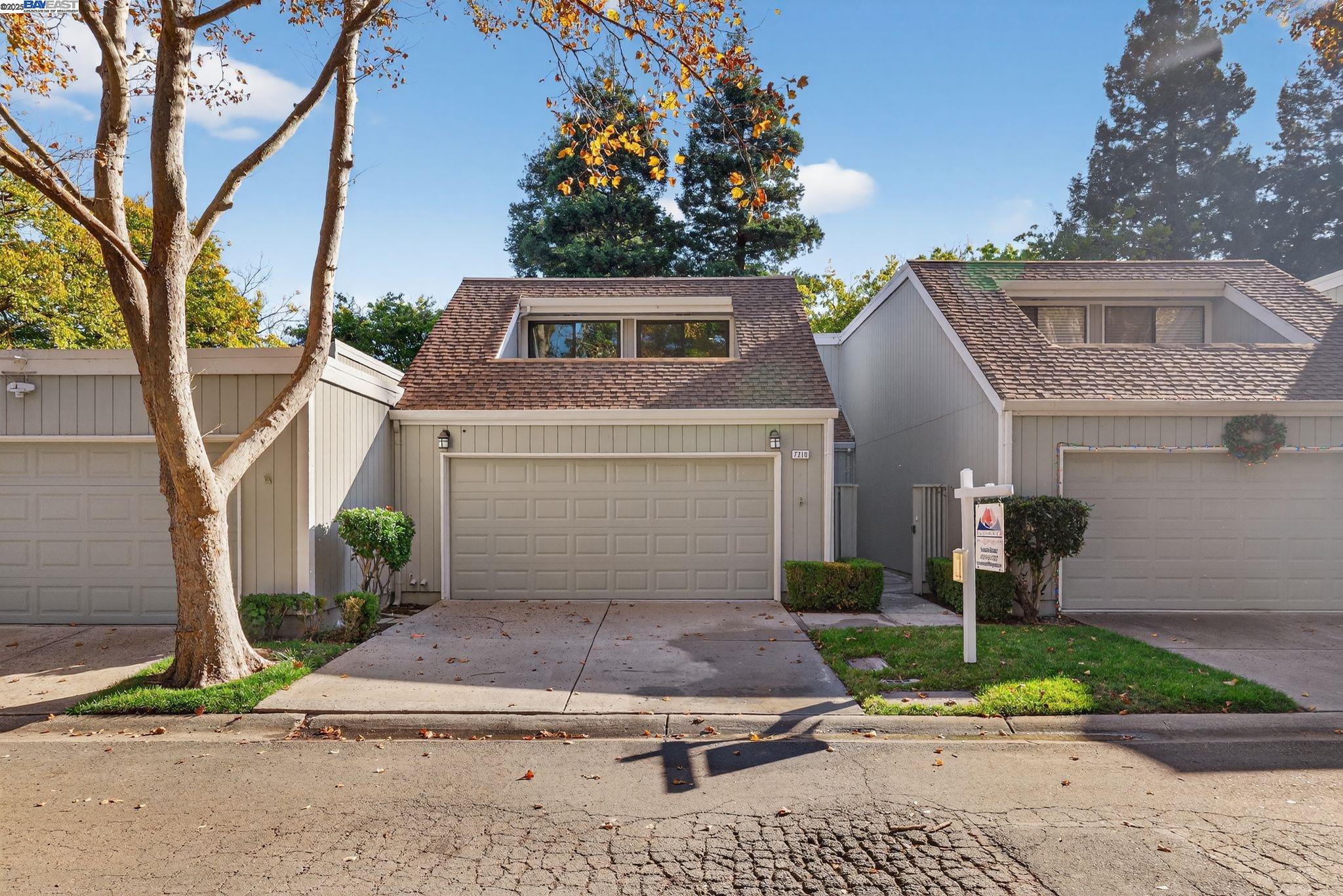 7210 Valley View Court Pleasanton, CA 94588 - Photo 2 of 44 a front view of a house with garden