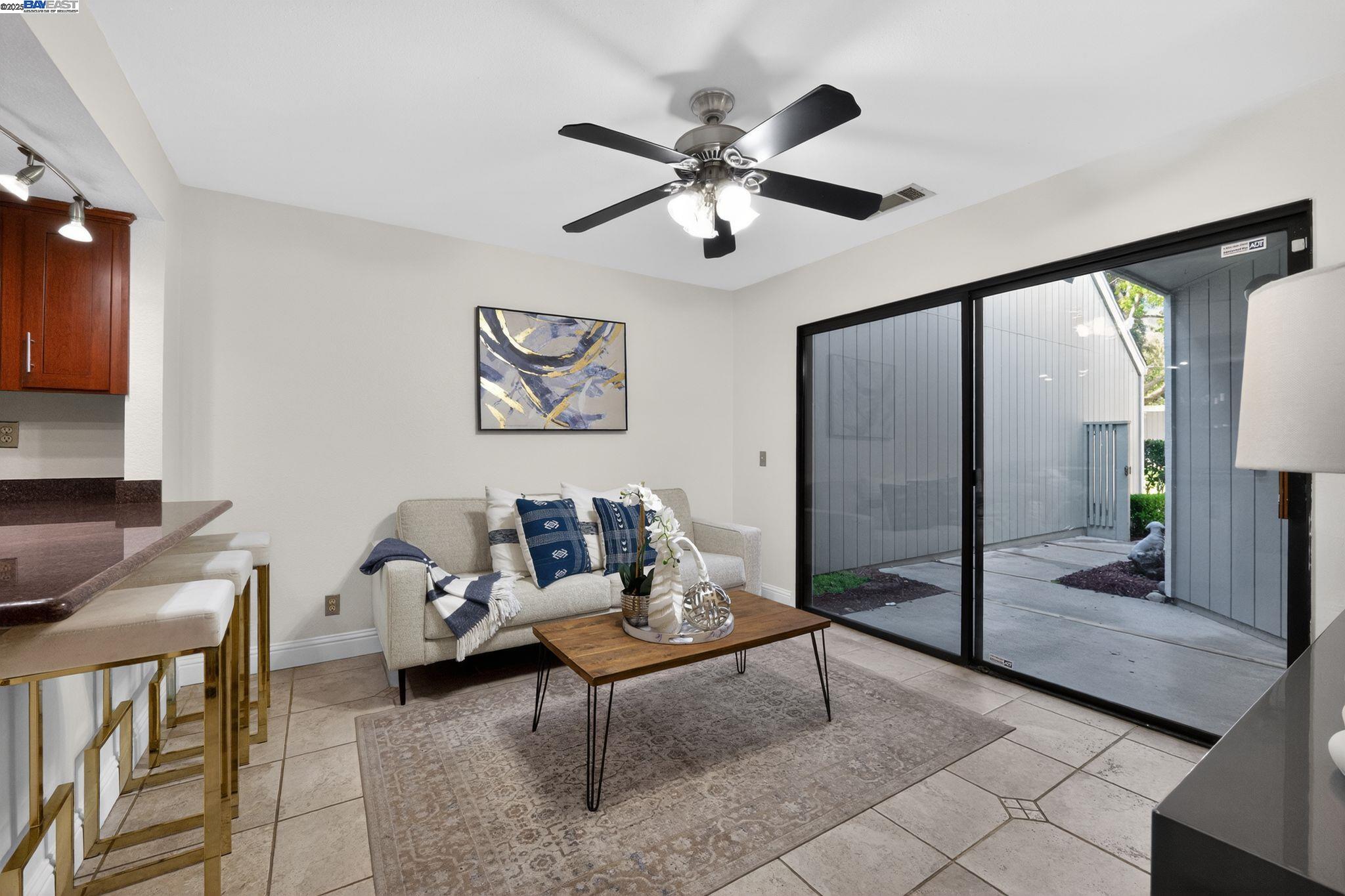 7210 Valley View Court Pleasanton, CA 94588 - Photo 5 of 44 a living room with furniture and a ceiling fan