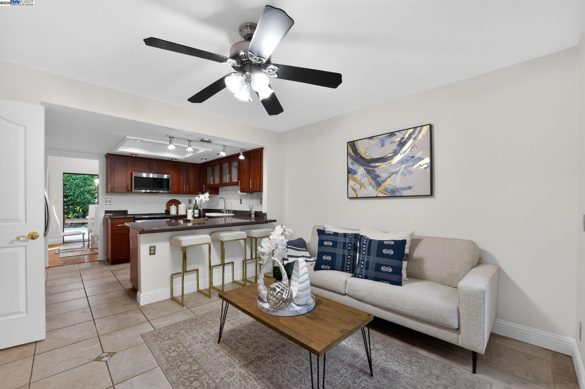 7210 Valley View Court Pleasanton, CA 94588 - Photo 6 of 44 a living room with furniture kitchen view and a window
