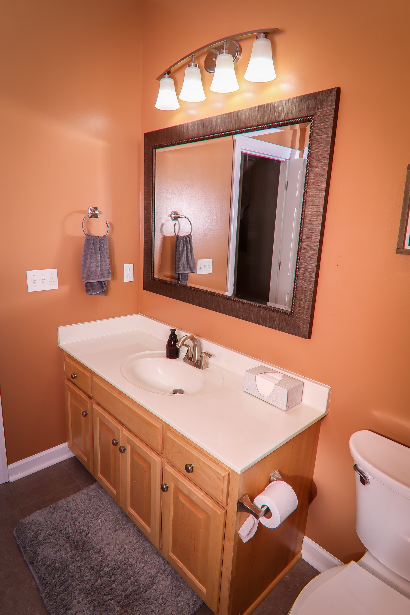 141 Hunters Ridge Drive Tullahoma, TN 37388 - Photo 41 of 49 a bathroom with a toilet sink and mirror