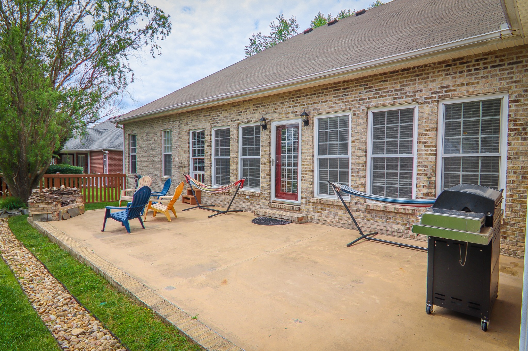 141 Hunters Ridge Drive Tullahoma, TN 37388 - Photo 8 of 49 a view of a house with backyard porch and sitting area