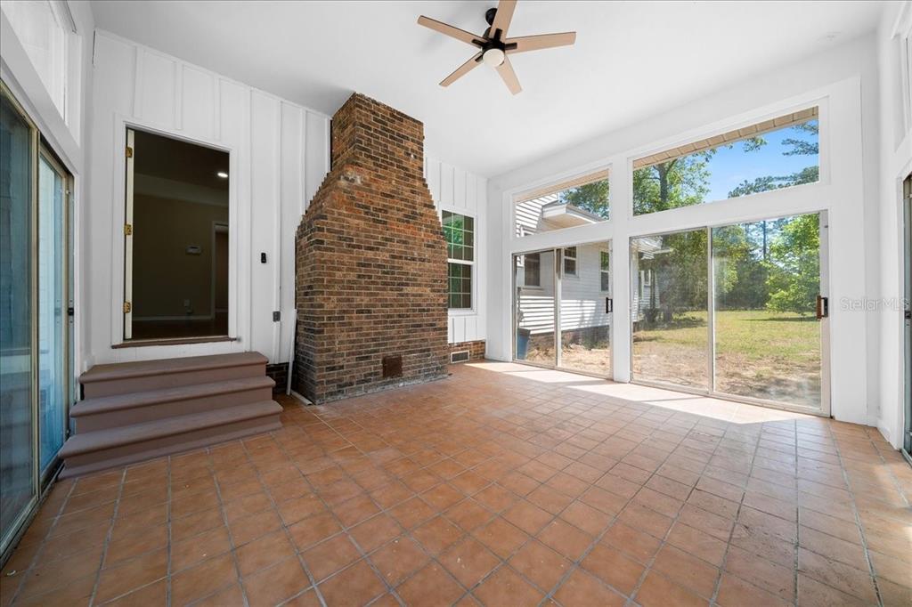 7808 Northeast 75th Street Gainesville, FL 32609 - Photo 40 of 78 a view of an empty room with a windows