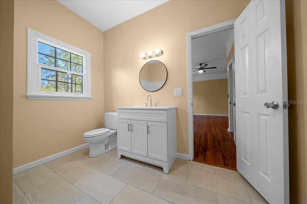 7808 Northeast 75th Street Gainesville, FL 32609 - Photo 54 of 78 a bathroom with a toilet sink and tub
