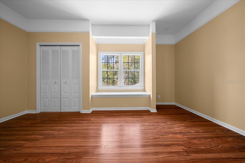 7808 Northeast 75th Street Gainesville, FL 32609 - Photo 58 of 78 a view of livingroom with hardwood floor and window in an empty room