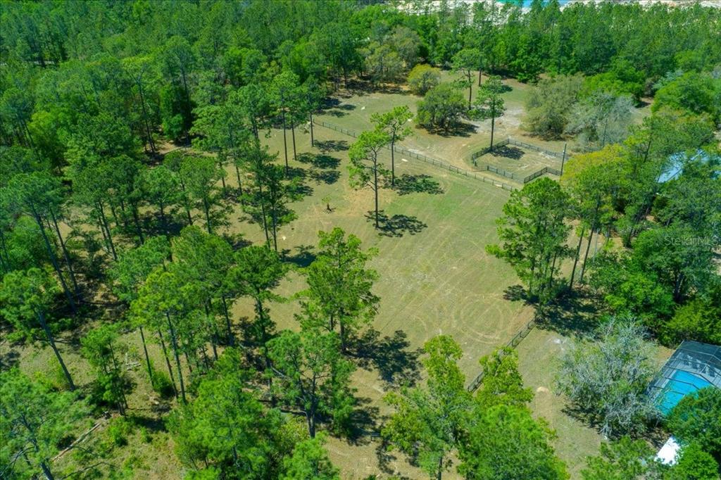 7808 Northeast 75th Street Gainesville, FL 32609 - Photo 66 of 78 an aerial view of residential house with outdoor space and trees all around