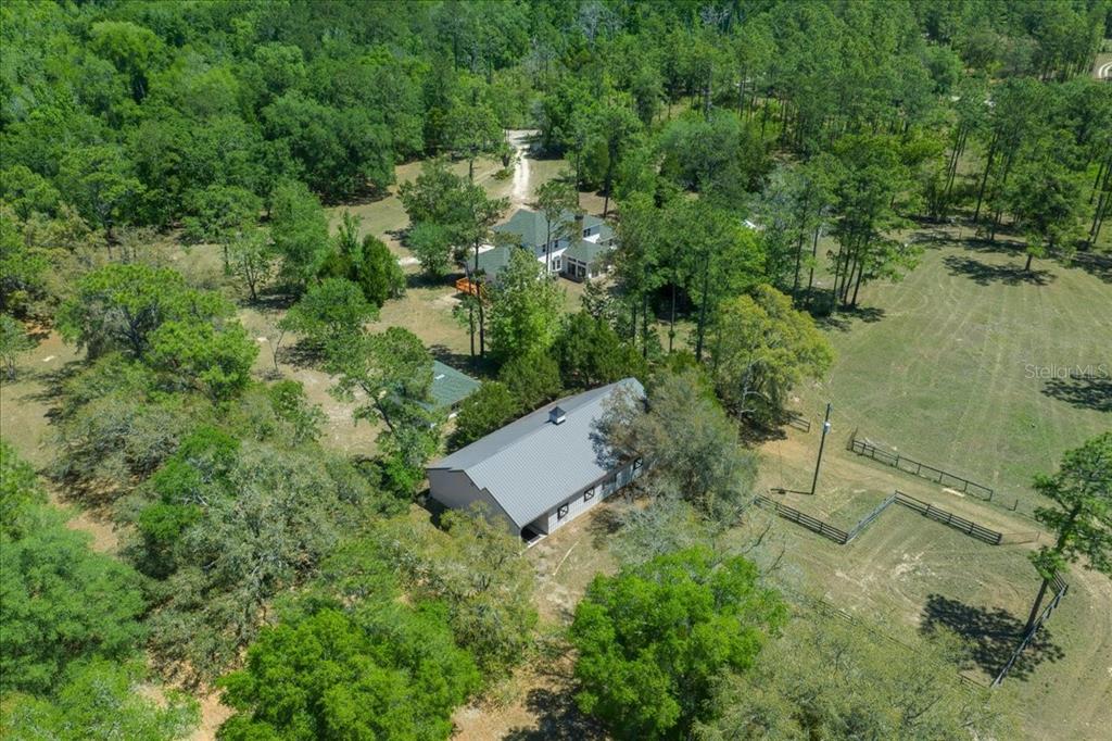 7808 Northeast 75th Street Gainesville, FL 32609 - Photo 77 of 78 an aerial view of a house with a yard